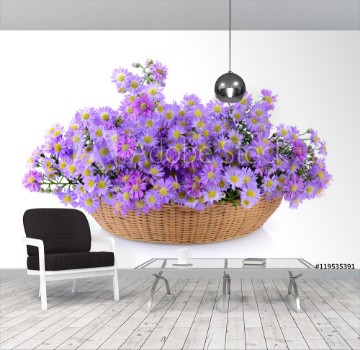 Bild på Purple flowers in basket on white background